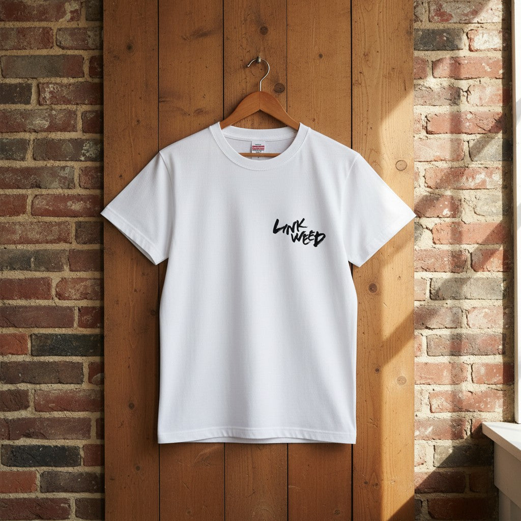 LINKWEED white cotton t-shirt with black graffiti-style logo on the left chest. Standard fit.